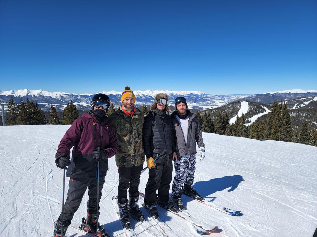 TRC members skiing during 2022 sober Mardi Gras ski trip