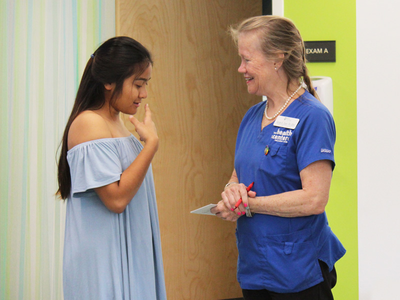 Student patient talking to a nurse
