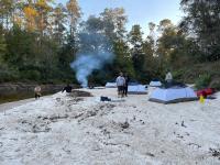 Students setting up camping tents