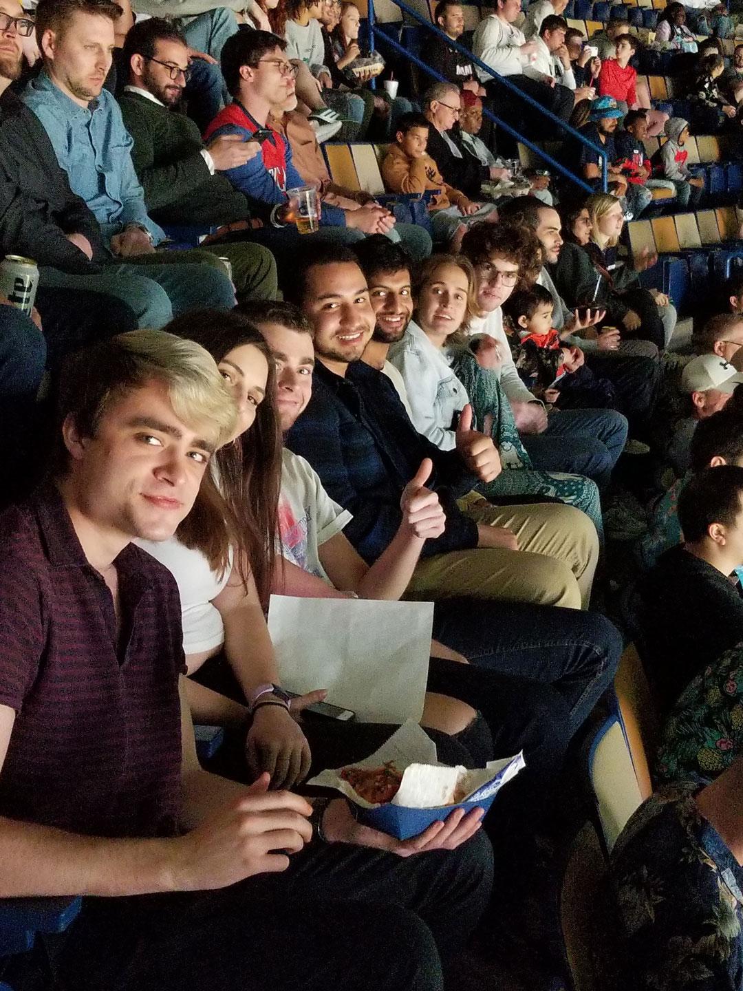 TRC members sitting in stands at a New Orleans Pelicans game