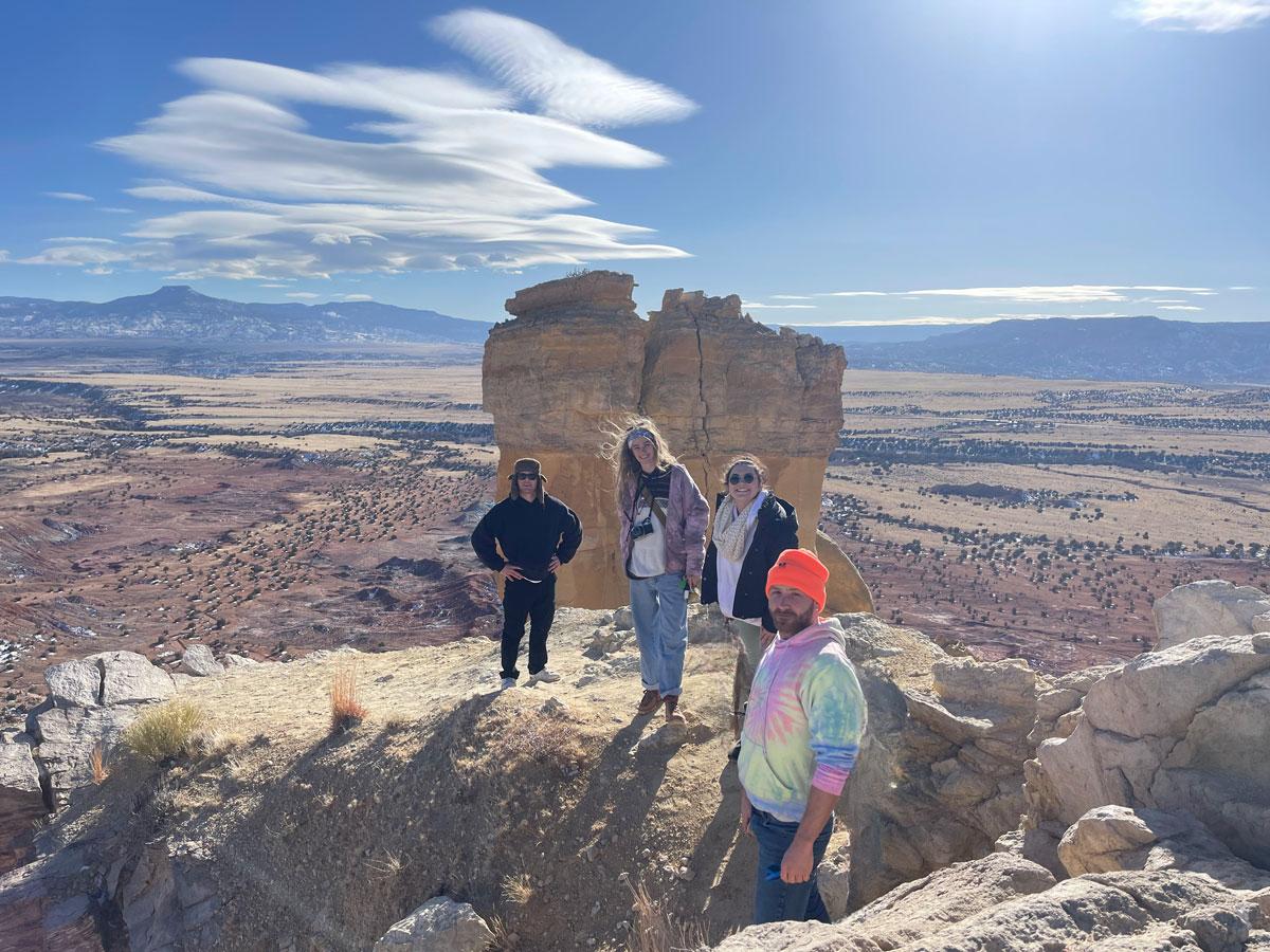Students hiking in Santa Fe mountainscape